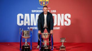 Hansi Flick z pucharem